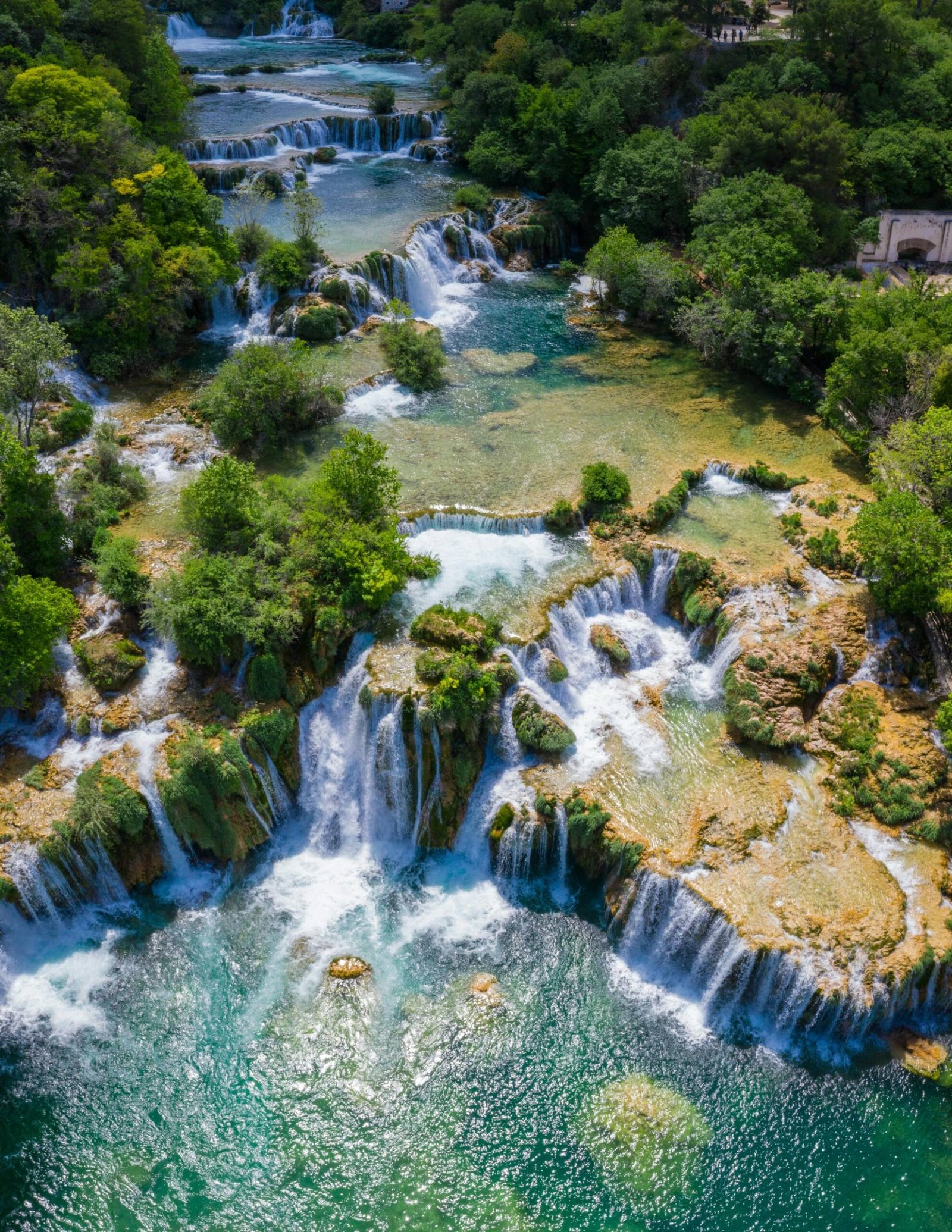 Private tour to Krka Waterfalls, Croatia, where you can enjoy the stunning waterfalls and lush nature with a private driver
